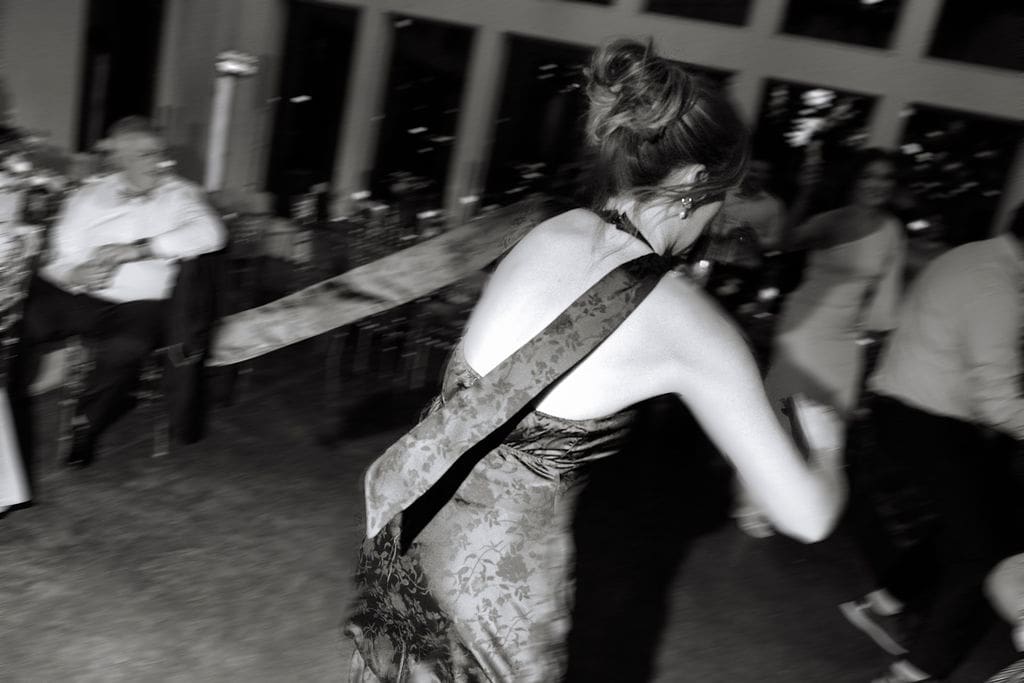 blurry photo of guest running during reception game