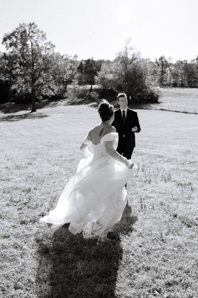 bride runs around groom showing off her dress from Joon Bridal