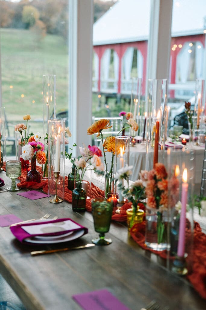 jewel toned reception flowers and decor